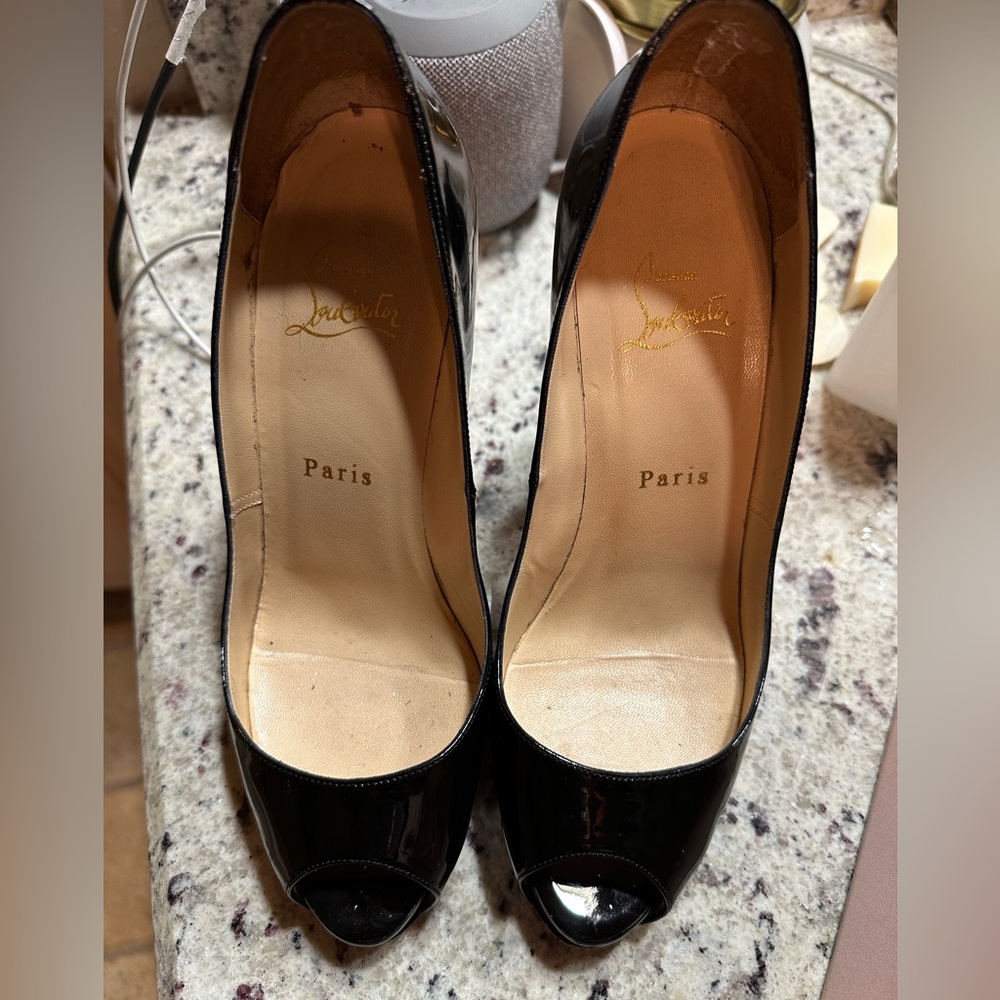 Authentic Christian Louboutin Very Prive 38.5 Black patent peep toe pump. 5”heel